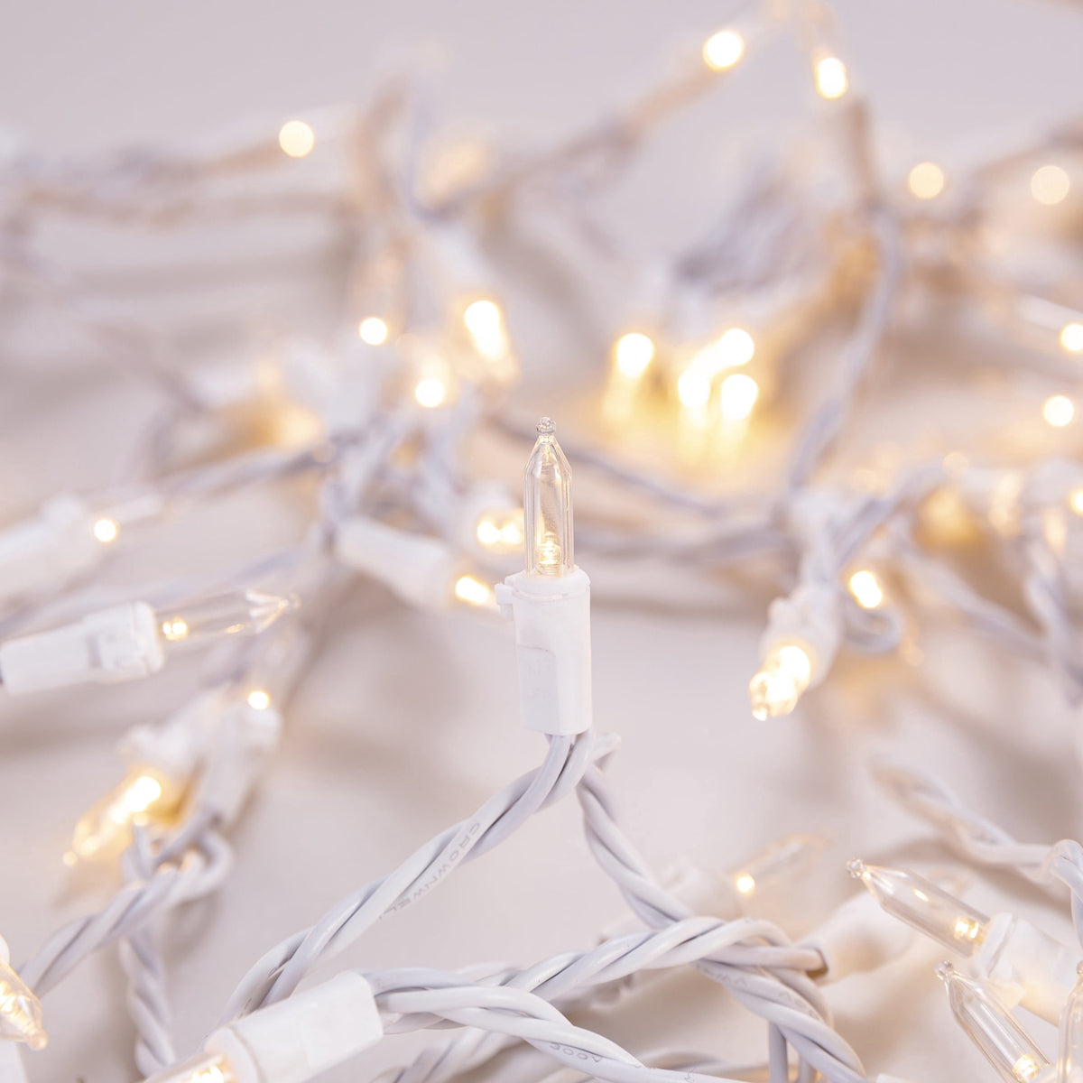 Indoor/Outdoor 300-Count LED Mini Christmas String Lights, Warm White, White Wire, 62.3', by Holiday Time