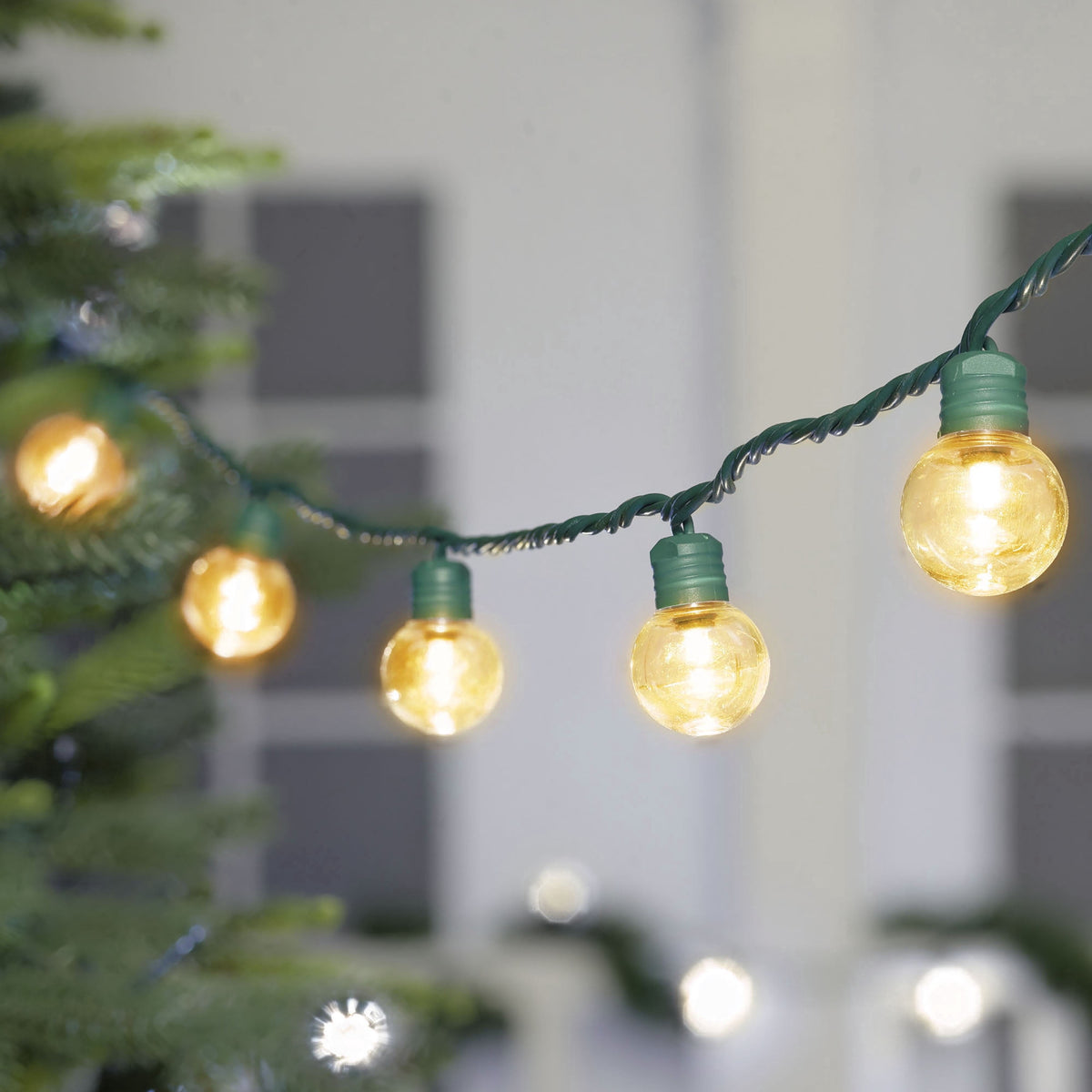 Indoor/Outdoor 100-Count LED Super Bright G30 Christmas String Lights, Warm White, Green Wire, 57', by Holiday Time