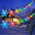 Fohil Solar Christmas Snowflake String Lights Outdoor Waterproof 100 LED Multicolor 8 Mode 39 ft for Christmas Tree Garden Fence Yard Decoration
